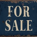 Cartel de se vende en ingles, bastante oxidada y antigua